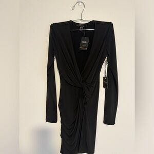 Black cocktail wrapped dress